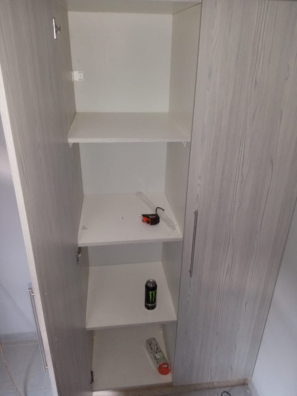 Bathroom vanity with under‑mount basin and storage